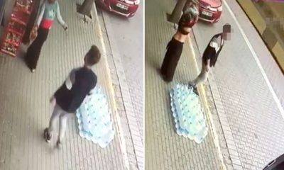 Parayı almakla suçlanınca sokak ortasında soyundu